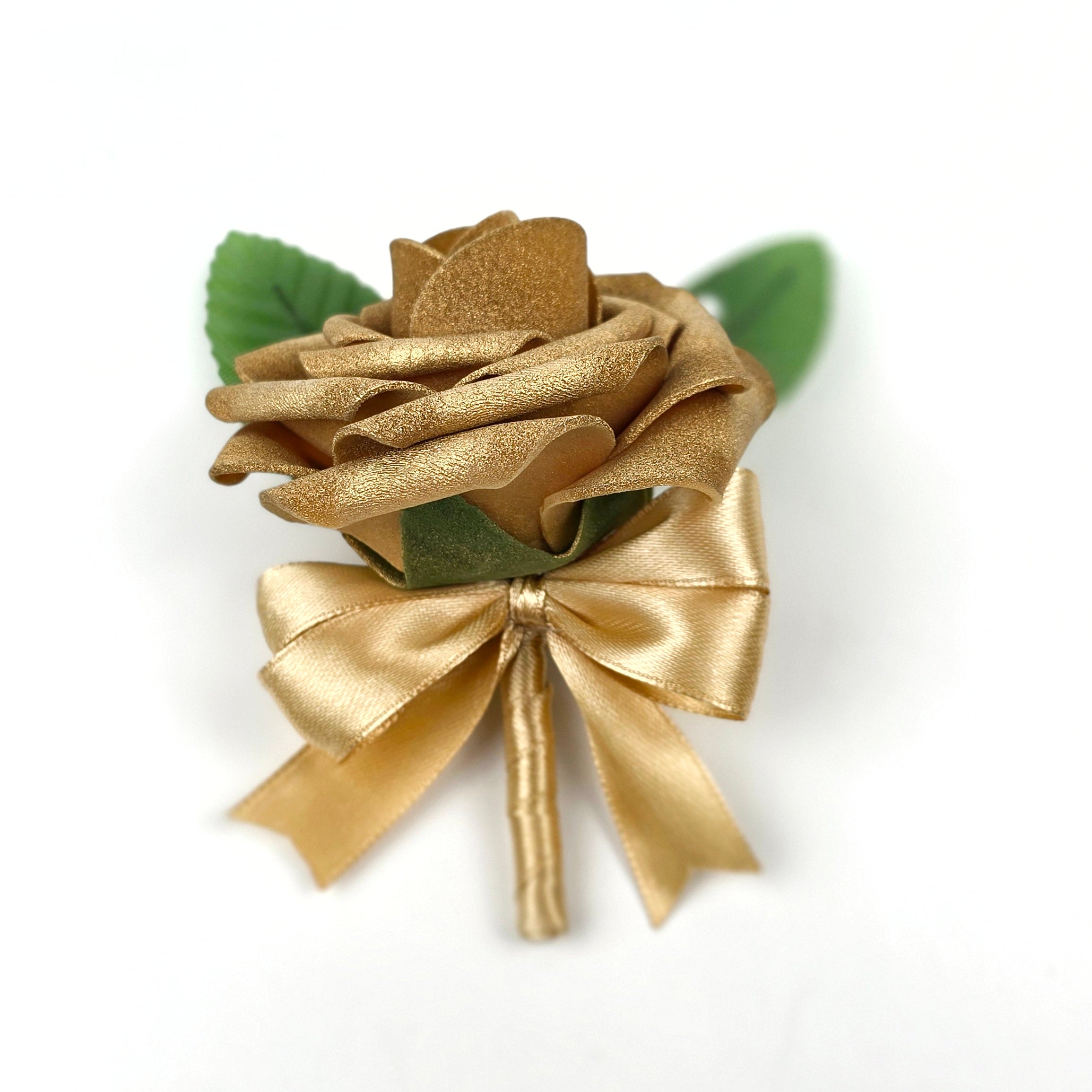 Gold boutonniere with gold ribbon and pearl pin. 2 green leaves