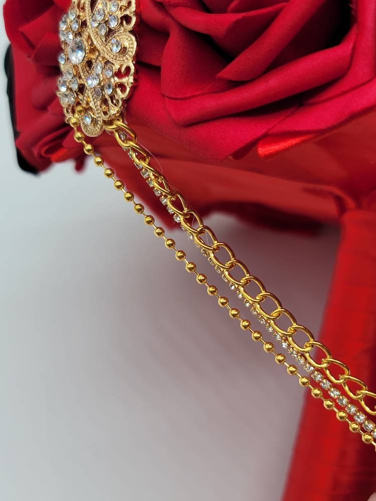 Black and Red Gothic Cascading Wedding Bouquet with Gold Skulls and Brooches