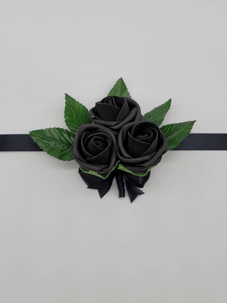 Black Corsages And Boutonnieres With Matching Bouquets Available In 27 Colors, Corsages Available In Pin On And Wrist