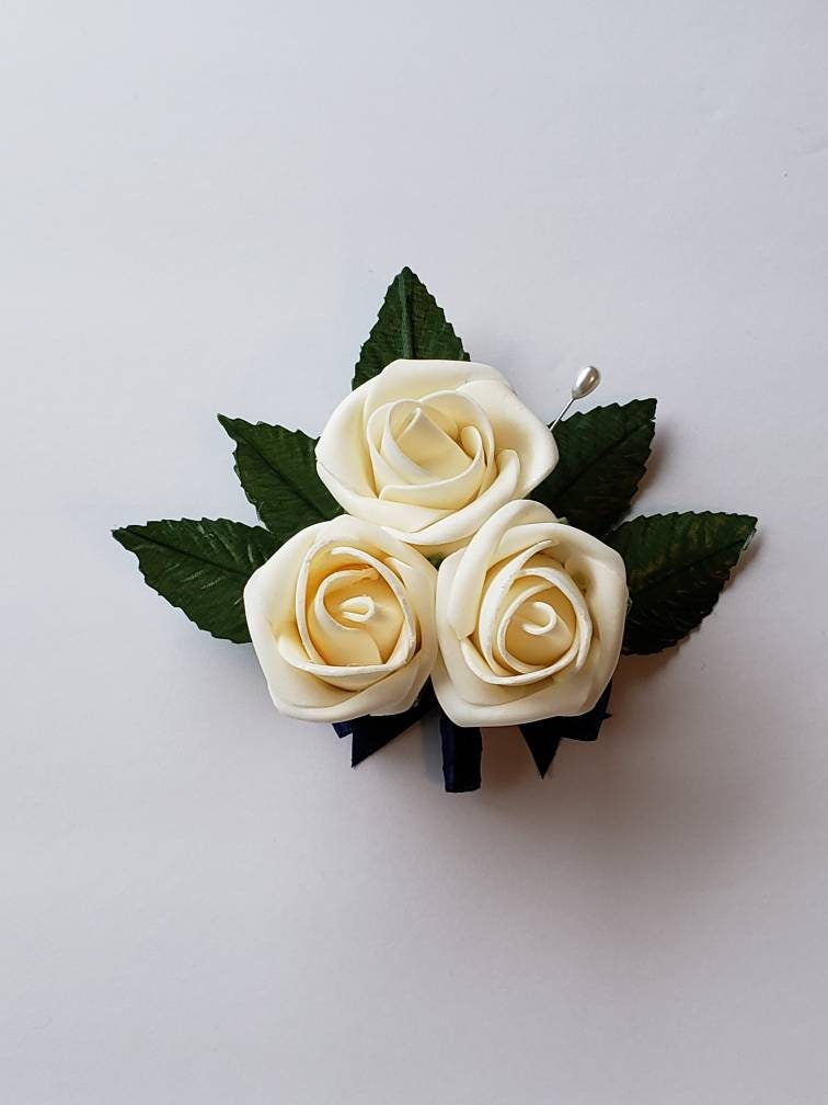 Cream And navy blue Boutonnieres And Corsages, Available In 27 Colors, Corsages Available In Pin On And Wrist, Matching Bouquets Available
