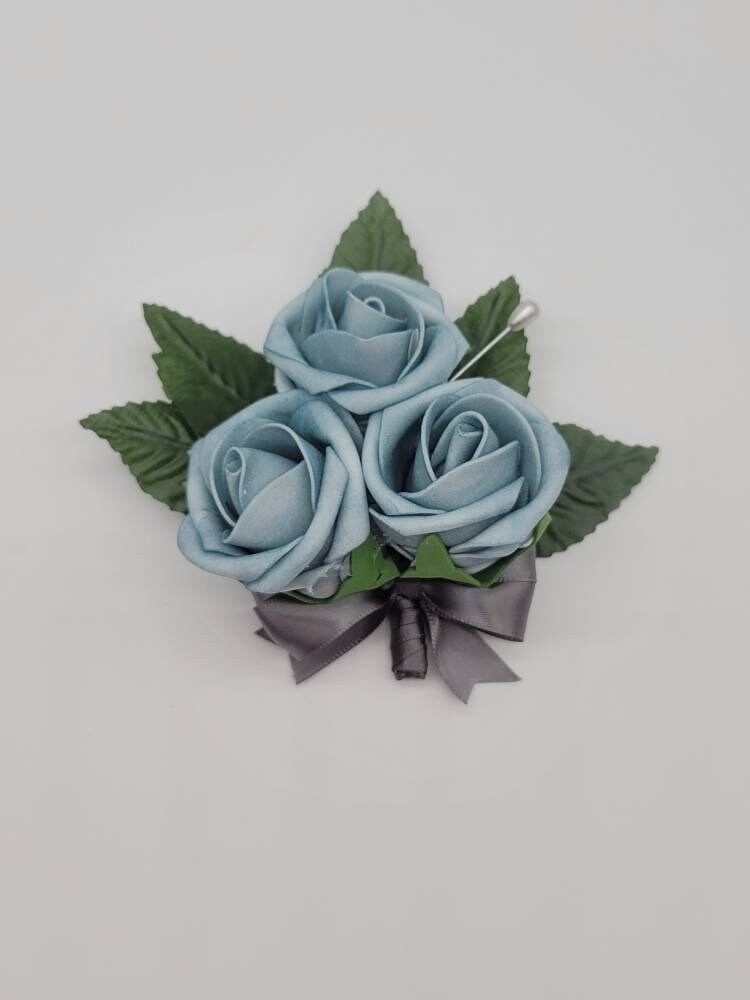 Light Dusty Blue Boutonnieres And Corsages, Available In 27 Colors, Corsages Available In Pin On And Wrist, Matching Bouquets Available