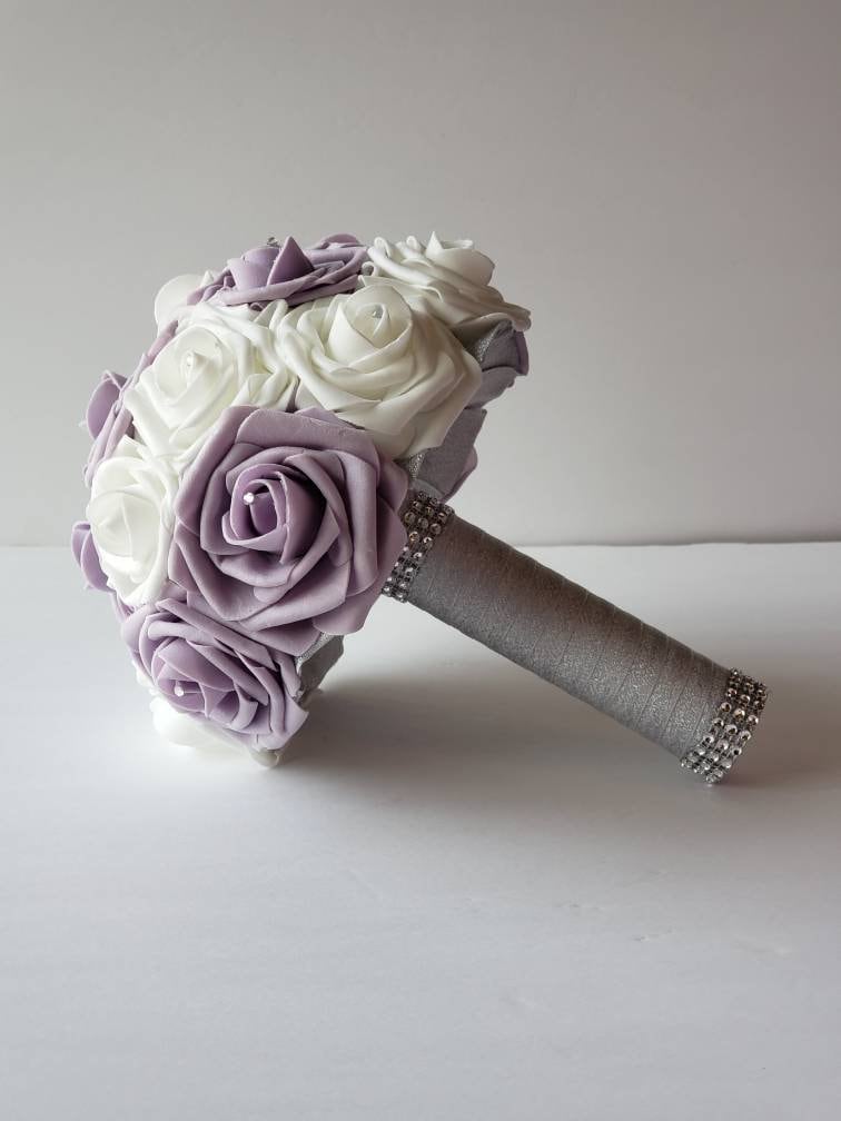 lilac and silver corsages and Boutonnieres,Available In 27 Colors, Corsages Are Available In Pin On And Wrist, Matching Bouquets Available