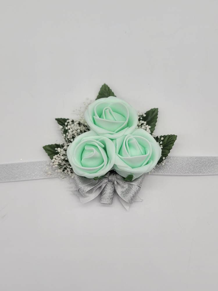 Mint and silver Boutonnieres And Corsages,Available In 27 Colors, Corsages Are Available In Pin On And Wrist, Matching Bouquets Available