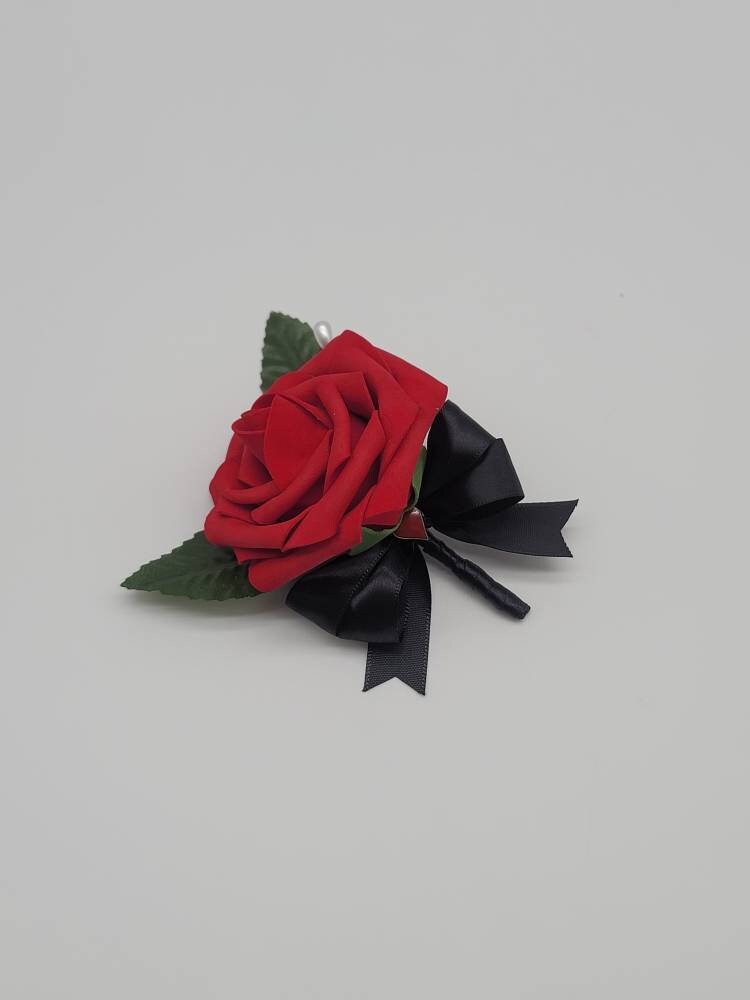 Vegas themed Blush and Ivory Boutonnieres and Corsages with Eucalyptus and card suites. Matching Wedding Bouquets Available