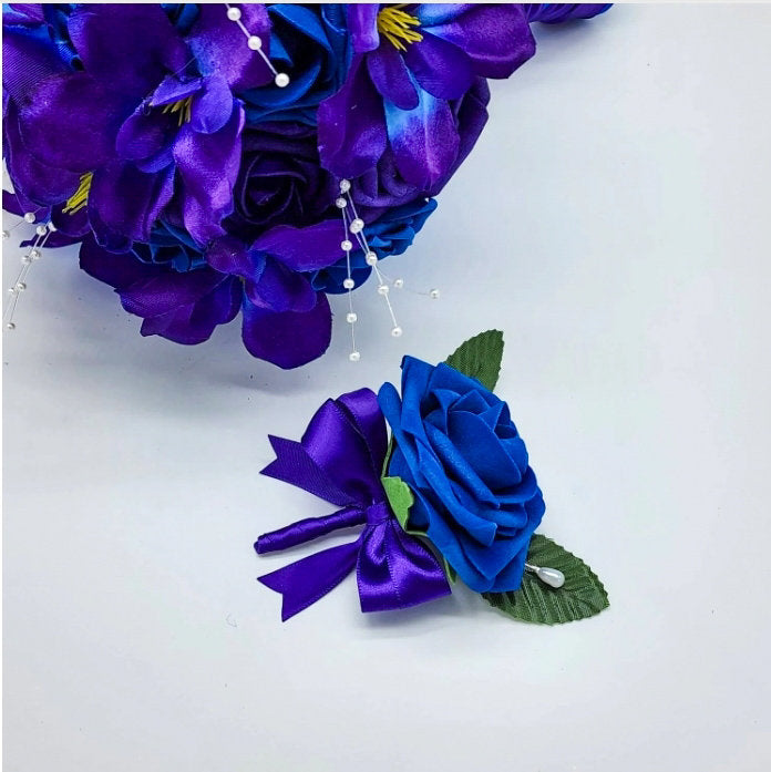 Royal blue boutonniere with purple ribbon