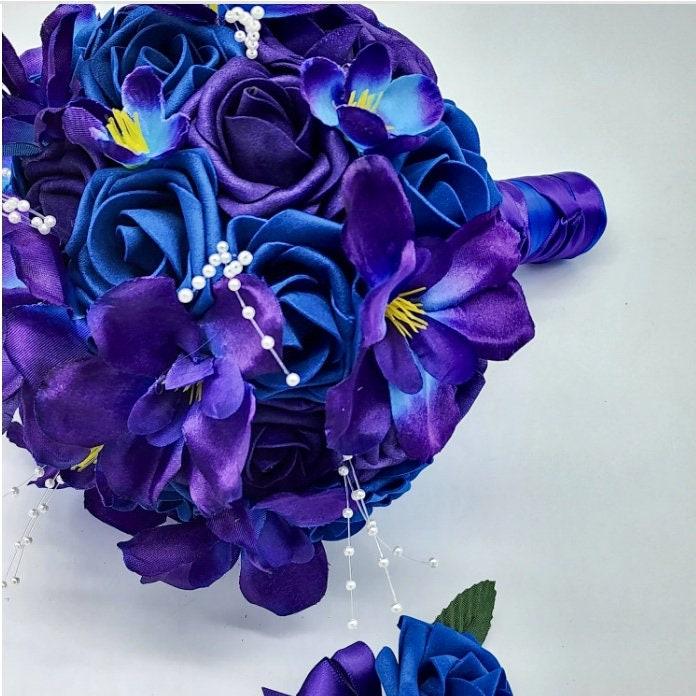 Galaxy bouquet sideview. Blue and purple bouquet with pearl spray