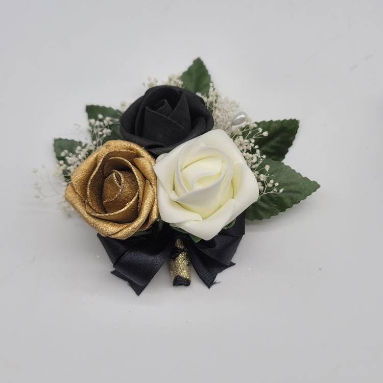 Black and gold corsage