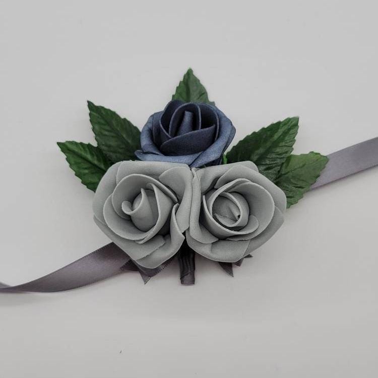 Dusty blue and gray wrist corsage