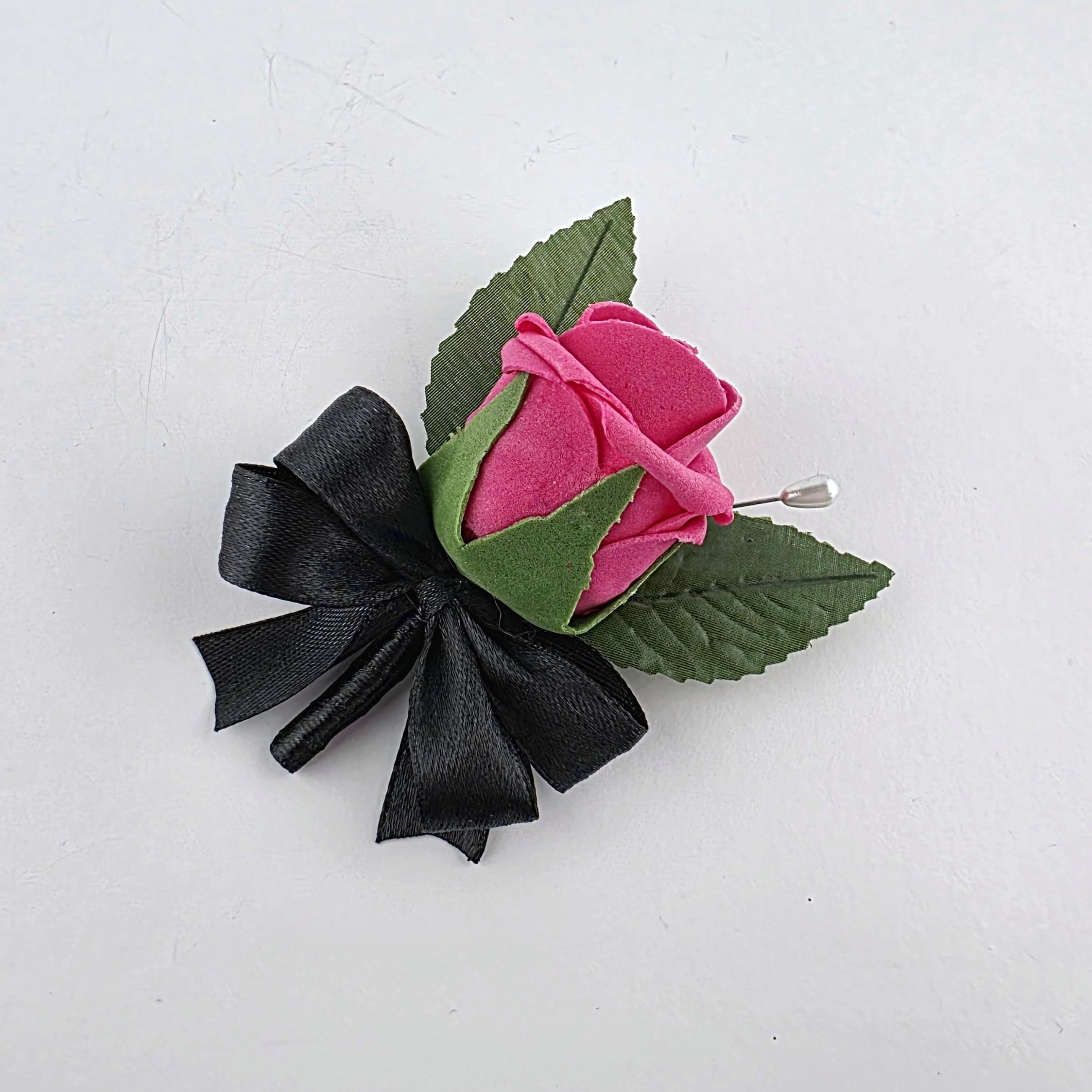 pink and black boutonniere for kids