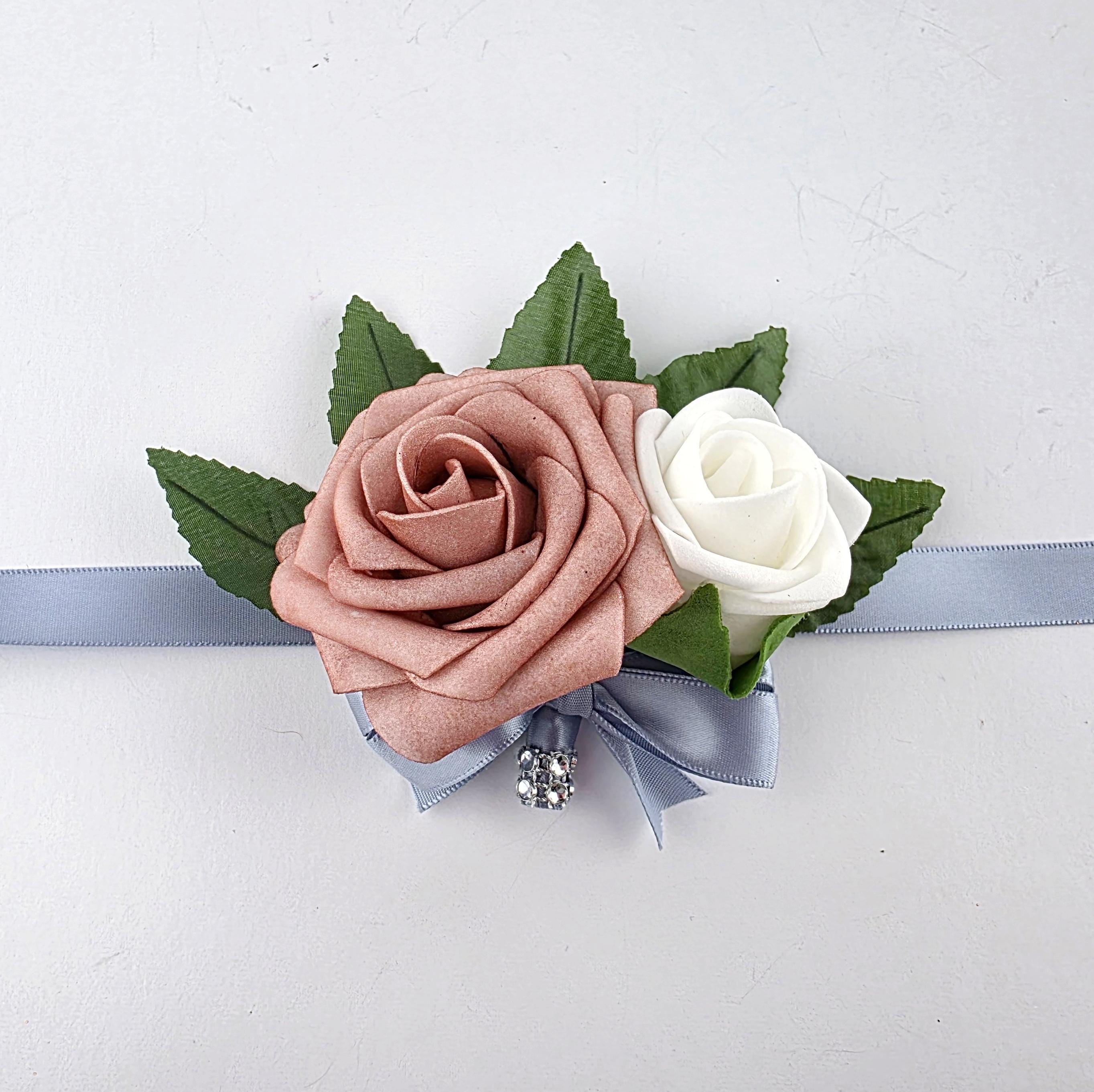 Dusty Rose and White Boutonnieres And Corsages with Dusty Blue- Corsages Are Available In Pin On And Wrist-Matching Bouquets Available