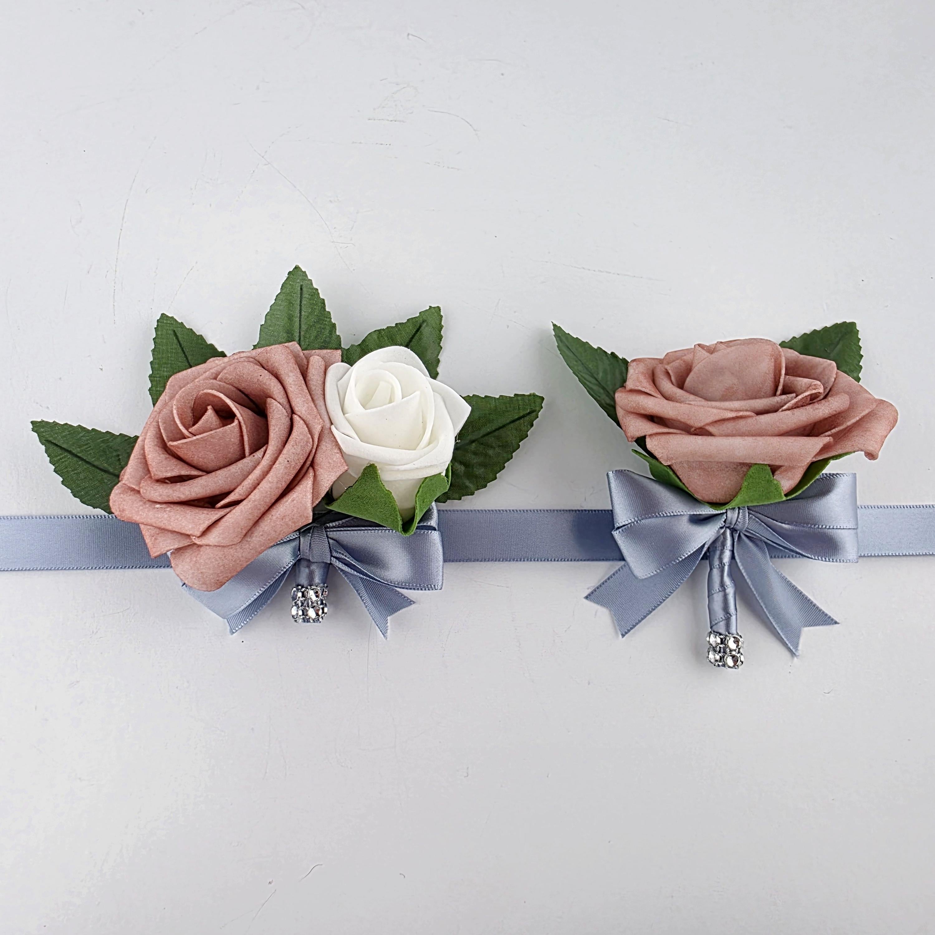 Dusty Rose and White Boutonnieres And Corsages with Dusty Blue- Corsages Are Available In Pin On And Wrist-Matching Bouquets Available