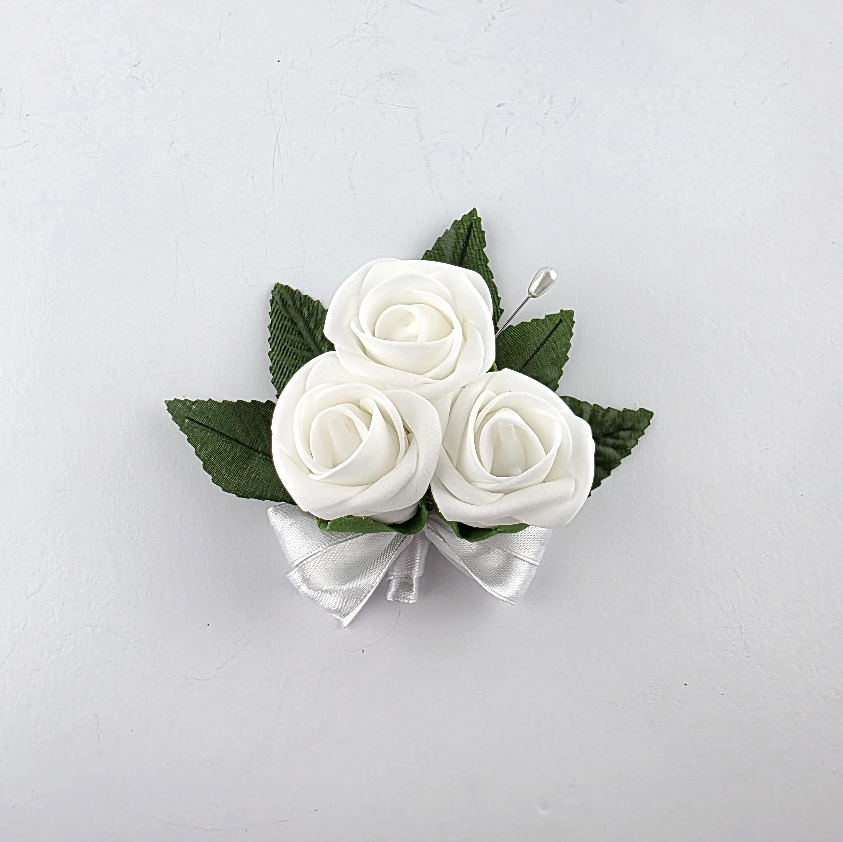 white pin on corsage 3 flower