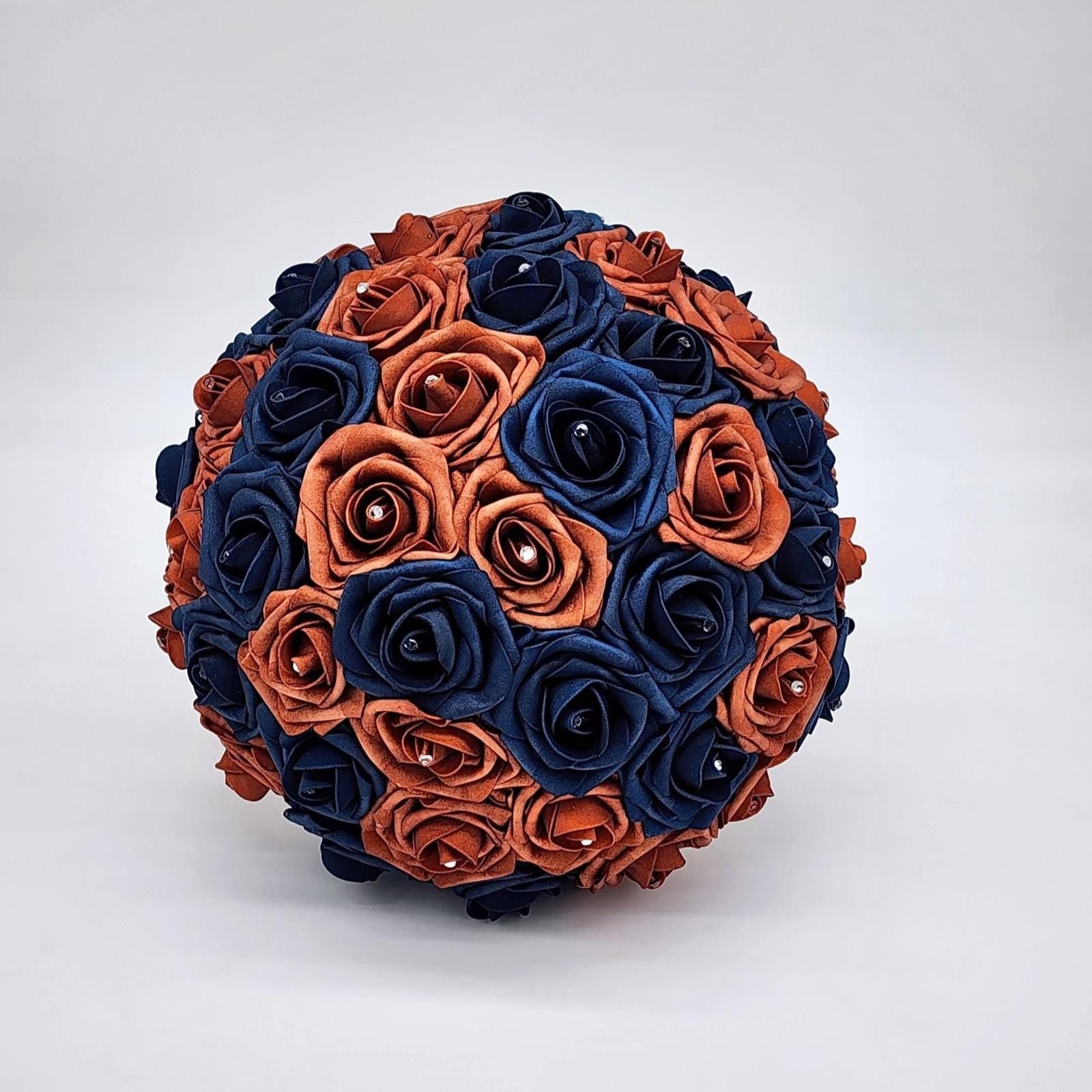 Burnt orange and Navy bridal bouquet with rhinestones on every rose.