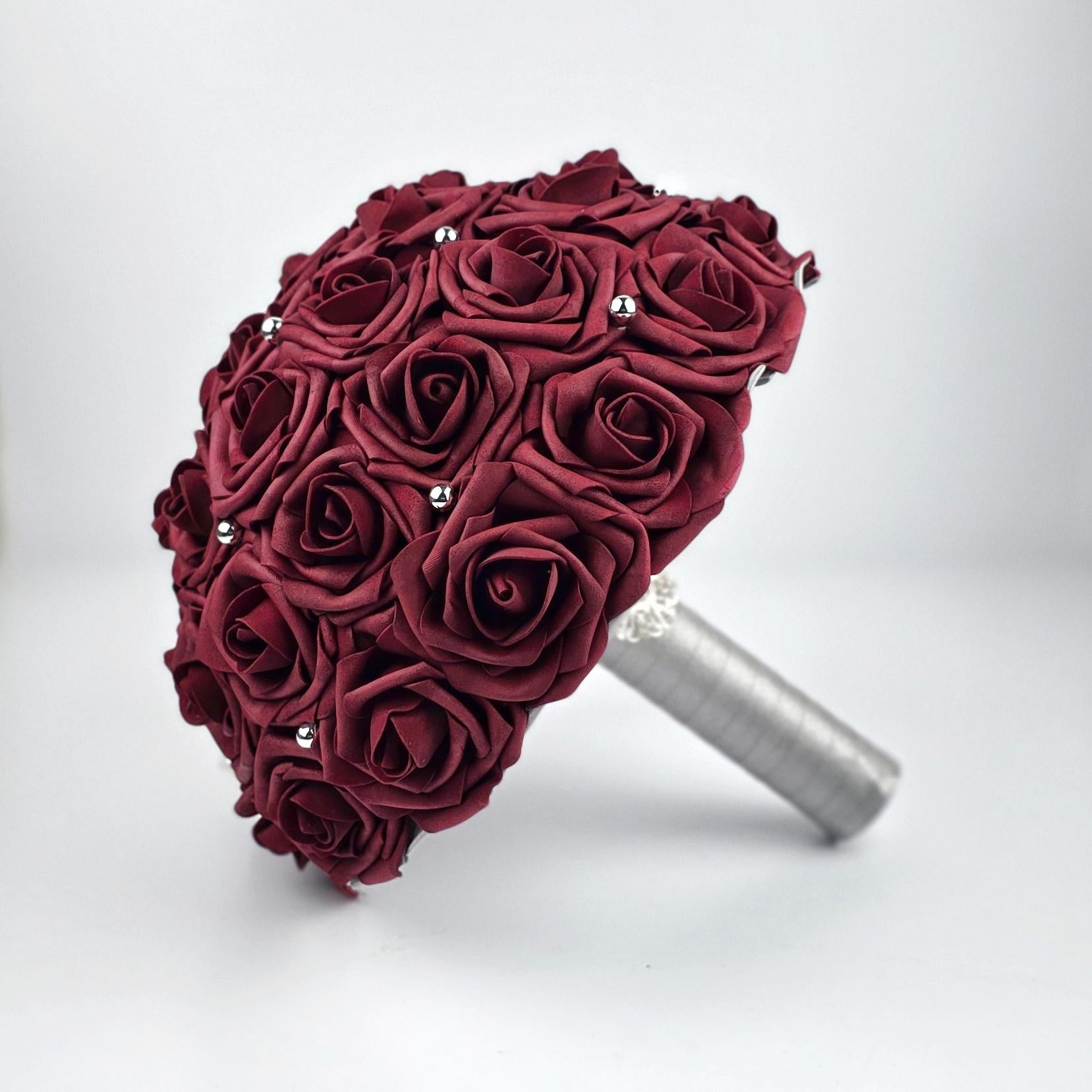 Burgundy bouquet with silver ribbon and silver balls