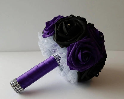 Black and purple bouquet with rhinestones in every rose. handle is made out of white tulle and purple satin ribbon and finished with silver bling wrap