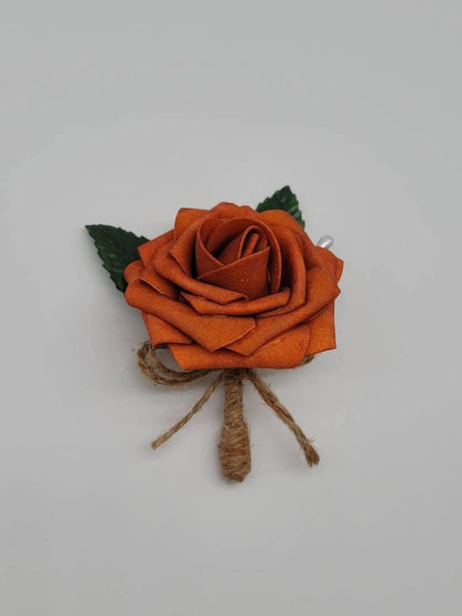 Burnt Orange boutonniere with twine ribbon