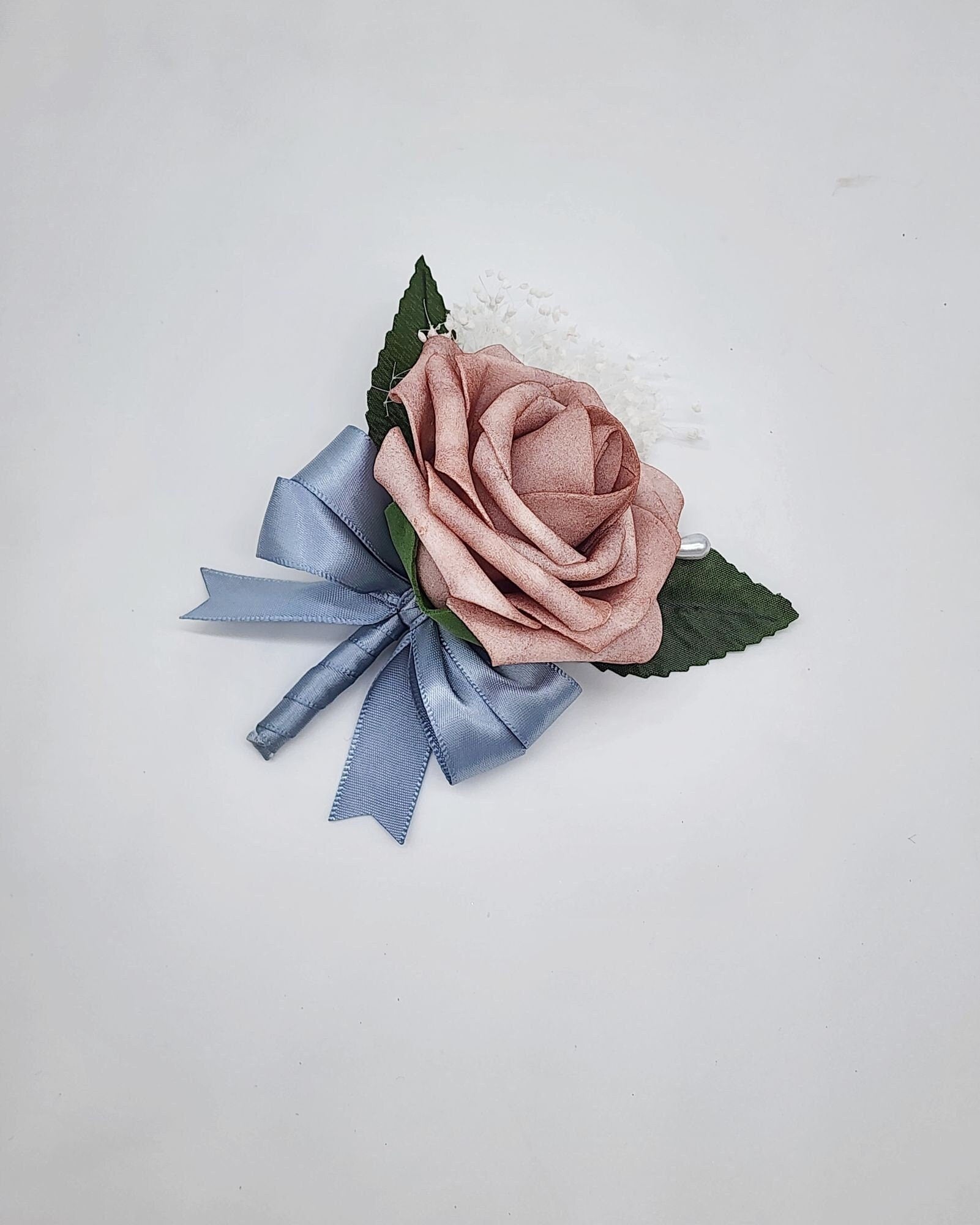 Dusty Rose boutonniere with dusty blue ribbon and baby&#39;s breath