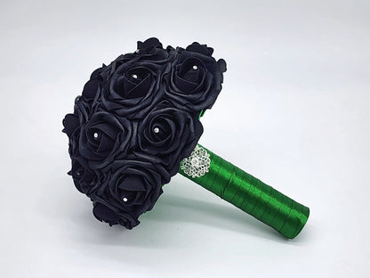 Black wedding bouquet made with real touch roses. Rhinestones on every rose. handle is made out of green satin ribbon and finished with silver brooch