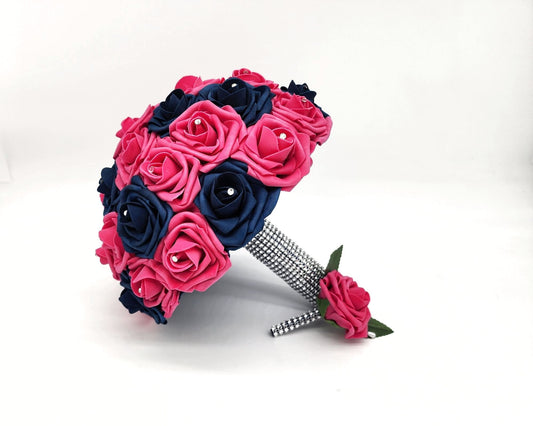 Hot pink and navy roses with rhinestones on every rose. Handle is made out of silver bling wrap. Hot pink boutonniere with rhinestone handle sits next to it.