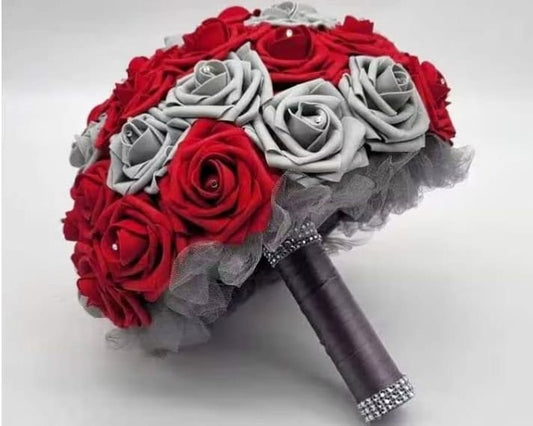 Red and Gray roses with rhinestones on every rose. handle is made up of gray tulle and gray satin ribbon with silver bling wrap.