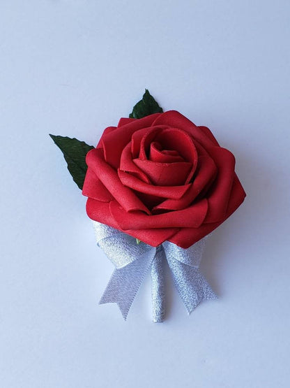 Red and silver boutonniere with silver ribbon. made from Real Touch Roses and Faux leaves