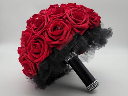 10 inches red wedding real touch roses with black satin ribbon handle. Silver bling wrap on the handle on top and bottom. Rhinestones are on every rose. Great for Bridal bouquets, Prom, Homecoming, Quinceanera Gothic, Halloween Weddings