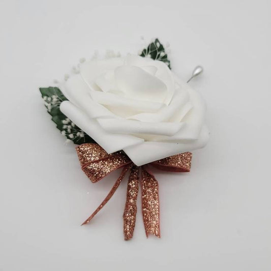 White Rose boutonniere with rose gold ribbon and baby&#39;s breath