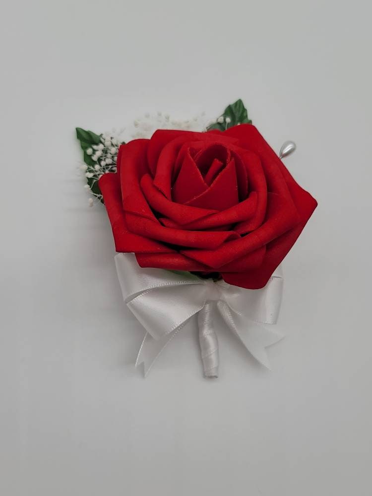 Red and White Wrist Corsage with Baby's Breath and Matching Boutonniere