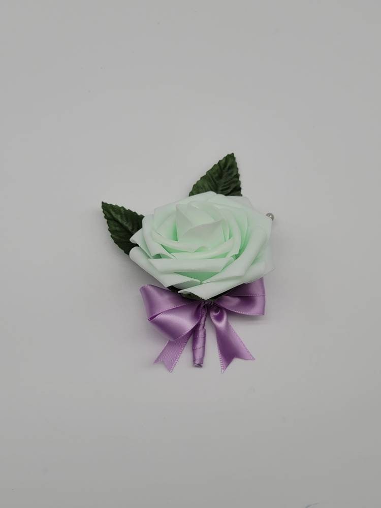 Mint and lilac Boutonnieres And Corsages,Available In 27 Colors, Corsages Are Available In Pin On And Wrist, Matching Bouquets Available