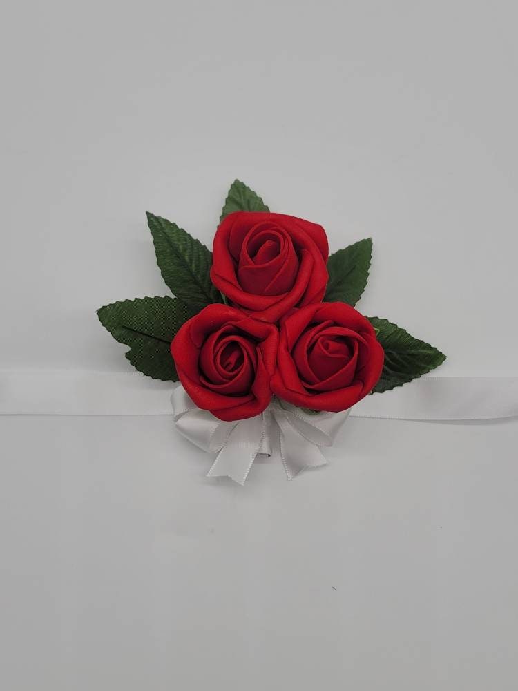 Red and White Boutonniere with Baby's Breath and Matching Corsage