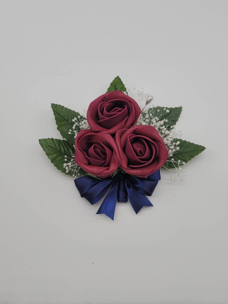 Burgundy And Navy Boutonnieres And Corsages, Available In 27 Colors, Corsages Available In Pin On And Wrist, Matching Bouquets Available