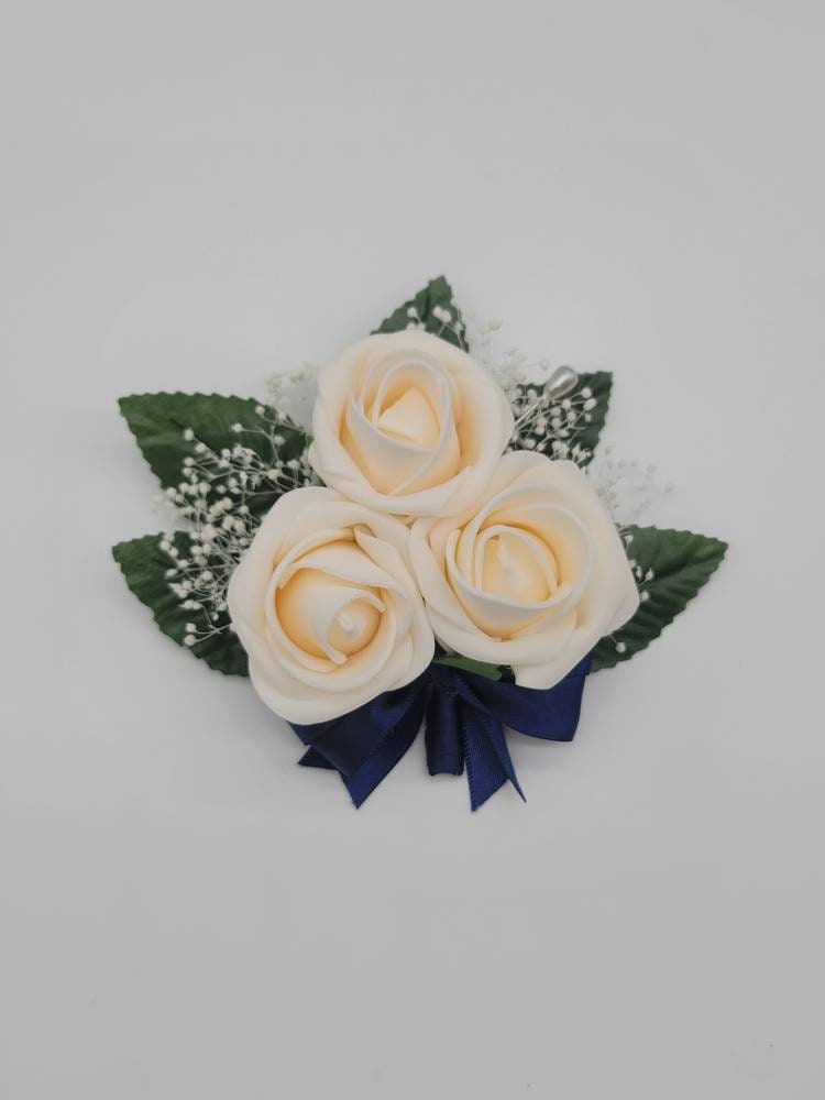 Cream And navy blue Boutonnieres And Corsages, Available In 27 Colors, Corsages Available In Pin On And Wrist, Matching Bouquets Available