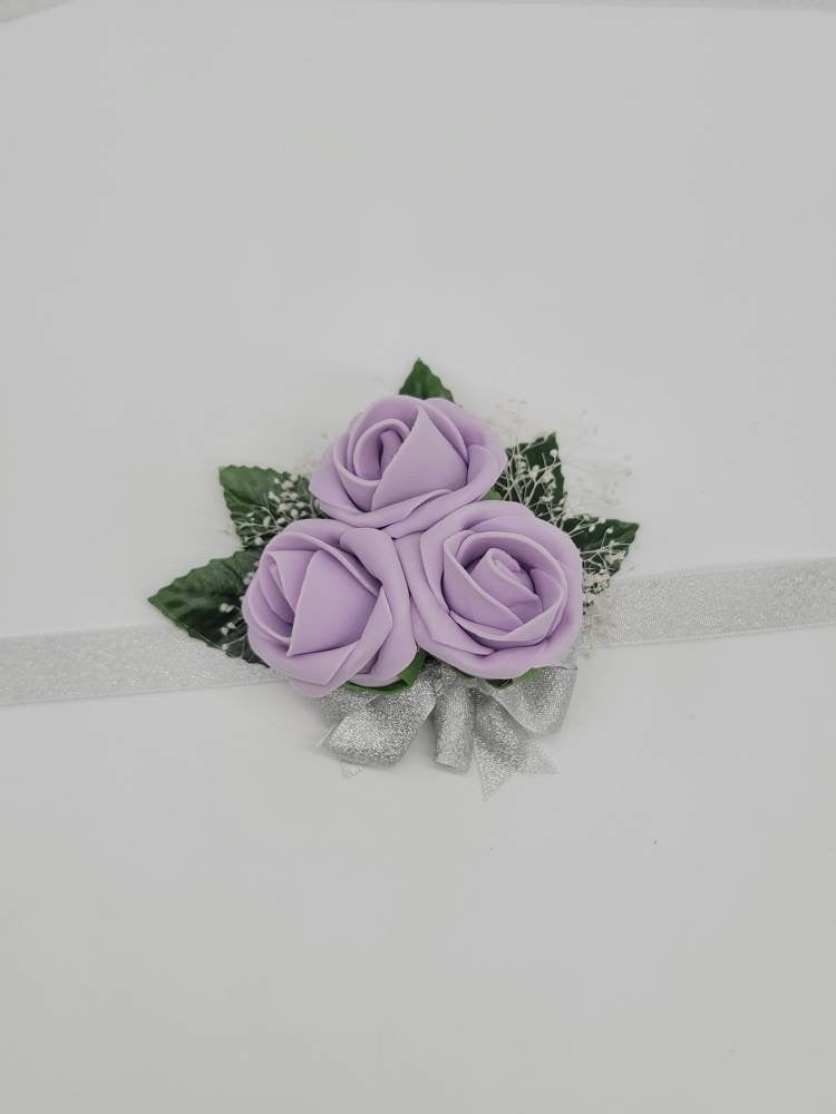 lilac and silver corsages and Boutonnieres,Available In 27 Colors, Corsages Are Available In Pin On And Wrist, Matching Bouquets Available