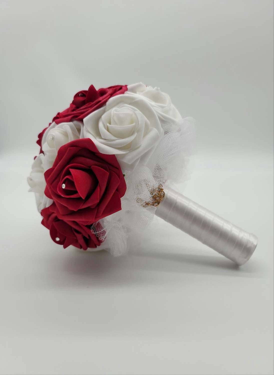 Red and White Wrist Corsage with Baby's Breath and Matching Boutonniere
