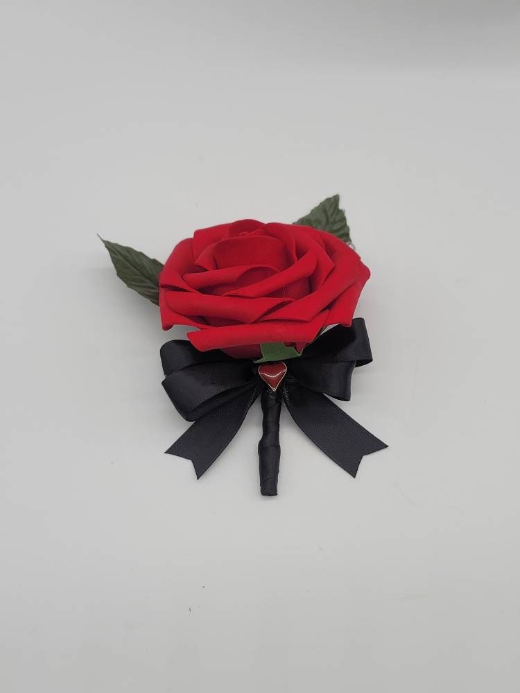 Vegas themed Blush and Ivory Boutonnieres and Corsages with Eucalyptus and card suites. Matching Wedding Bouquets Available