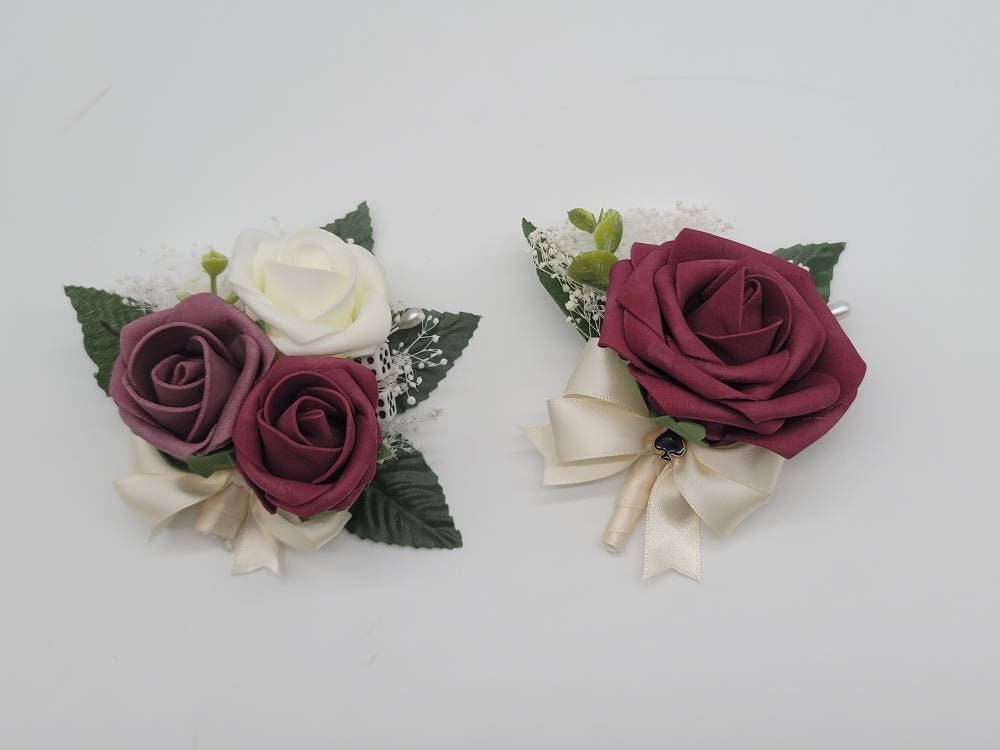 Vegas themed Blush and Ivory Boutonnieres and Corsages with Eucalyptus and card suites. Matching Wedding Bouquets Available