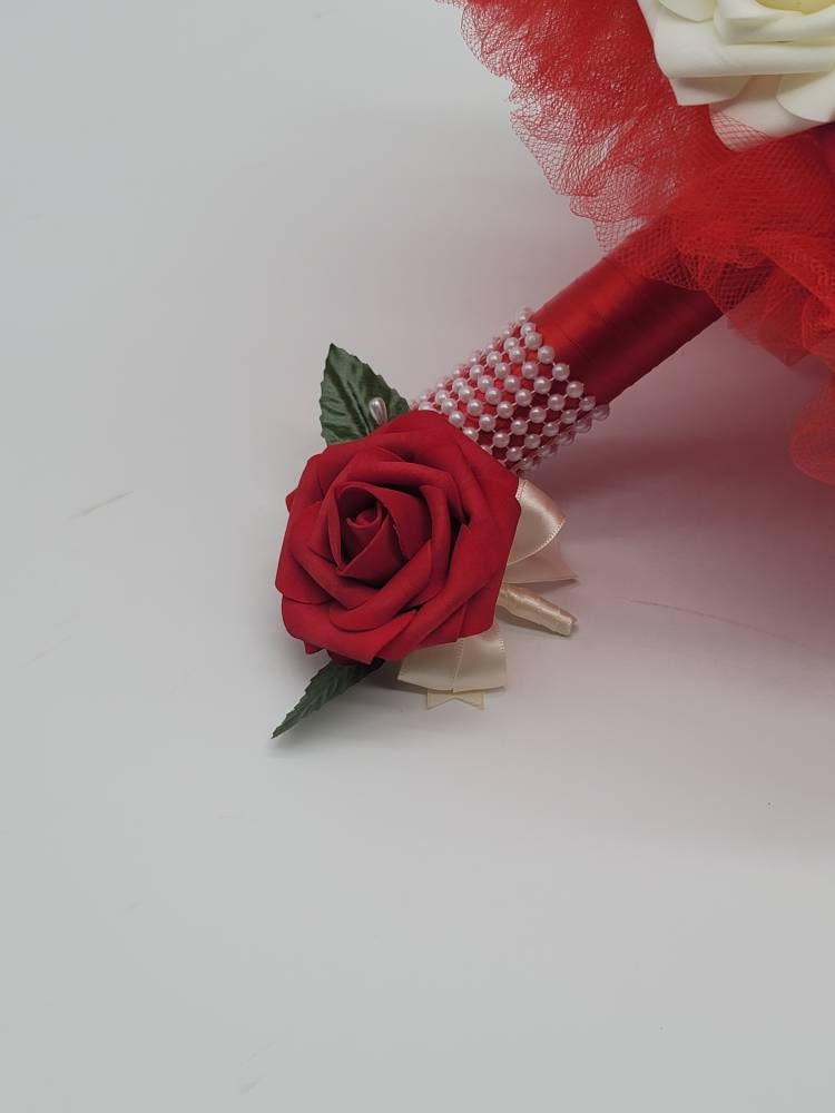 Red and Ivory Wrist Corsage with Baby's Breath and Matching Boutonniere