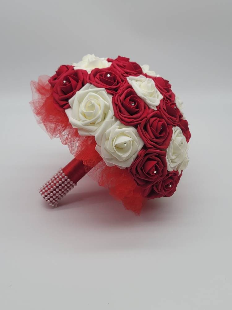 Red and Ivory Wrist Corsage with Baby's Breath and Matching Boutonniere