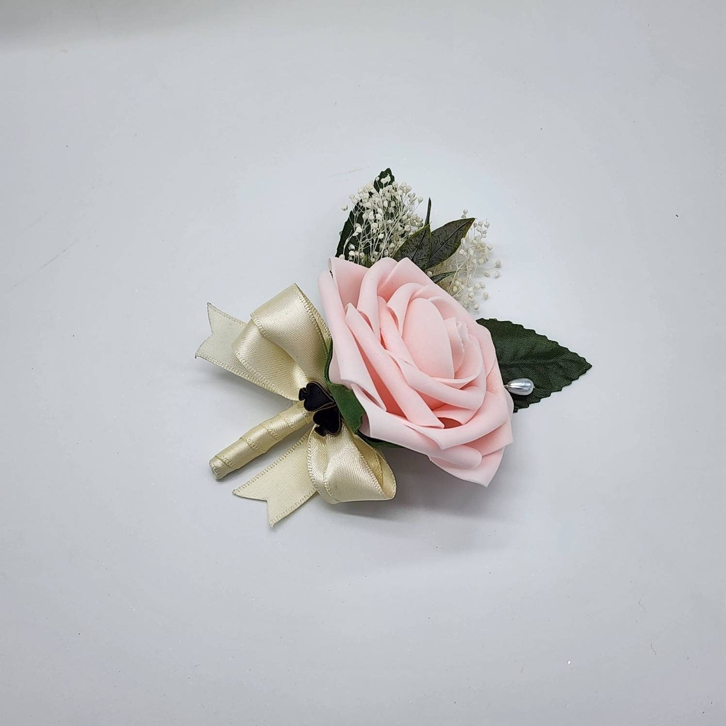 Vegas themed Blush and Ivory Boutonnieres and Corsages with Eucalyptus and card suites. Matching Wedding Bouquets Available