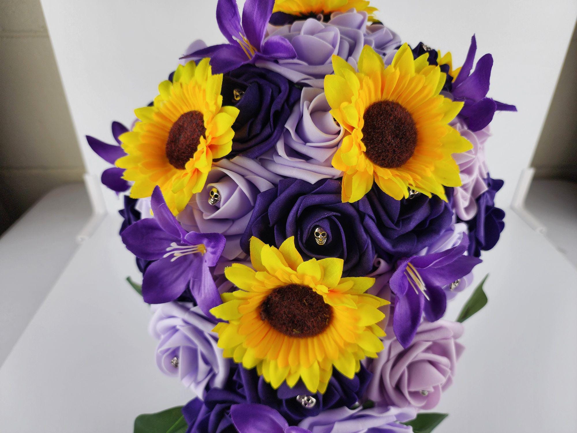 Gothic Skull Cascading Wedding Bouquet With Lilac, Lavender, and Dark Purple Roses, Lilies and Sunflowers.