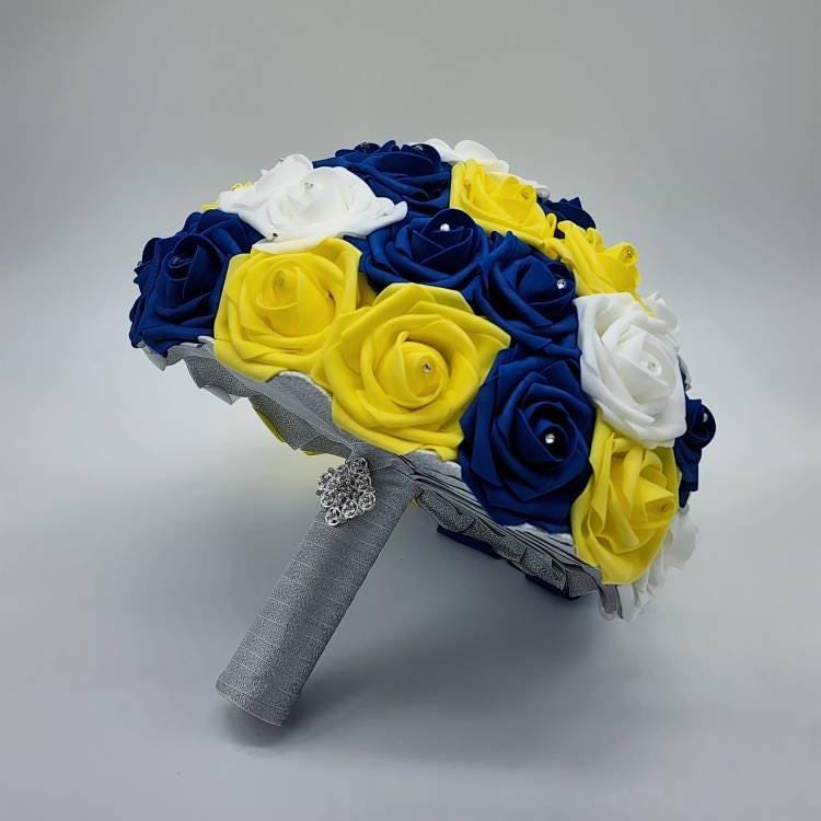 Yellow, royal blue, and white bouquet