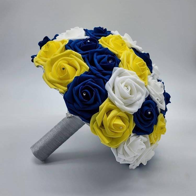 Royal blue, white, and yellow bouquet