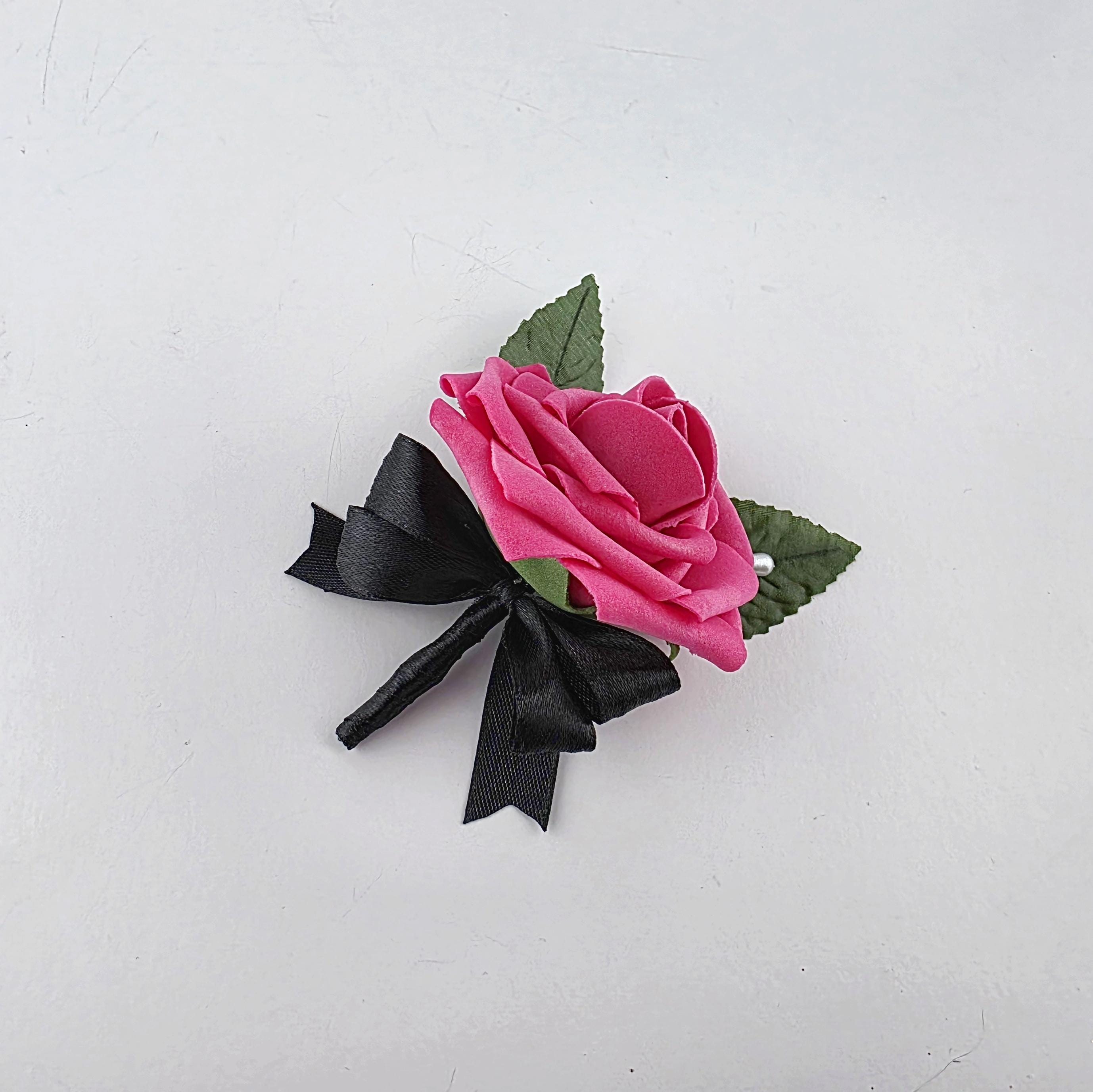 Hot pink and black boutonniere