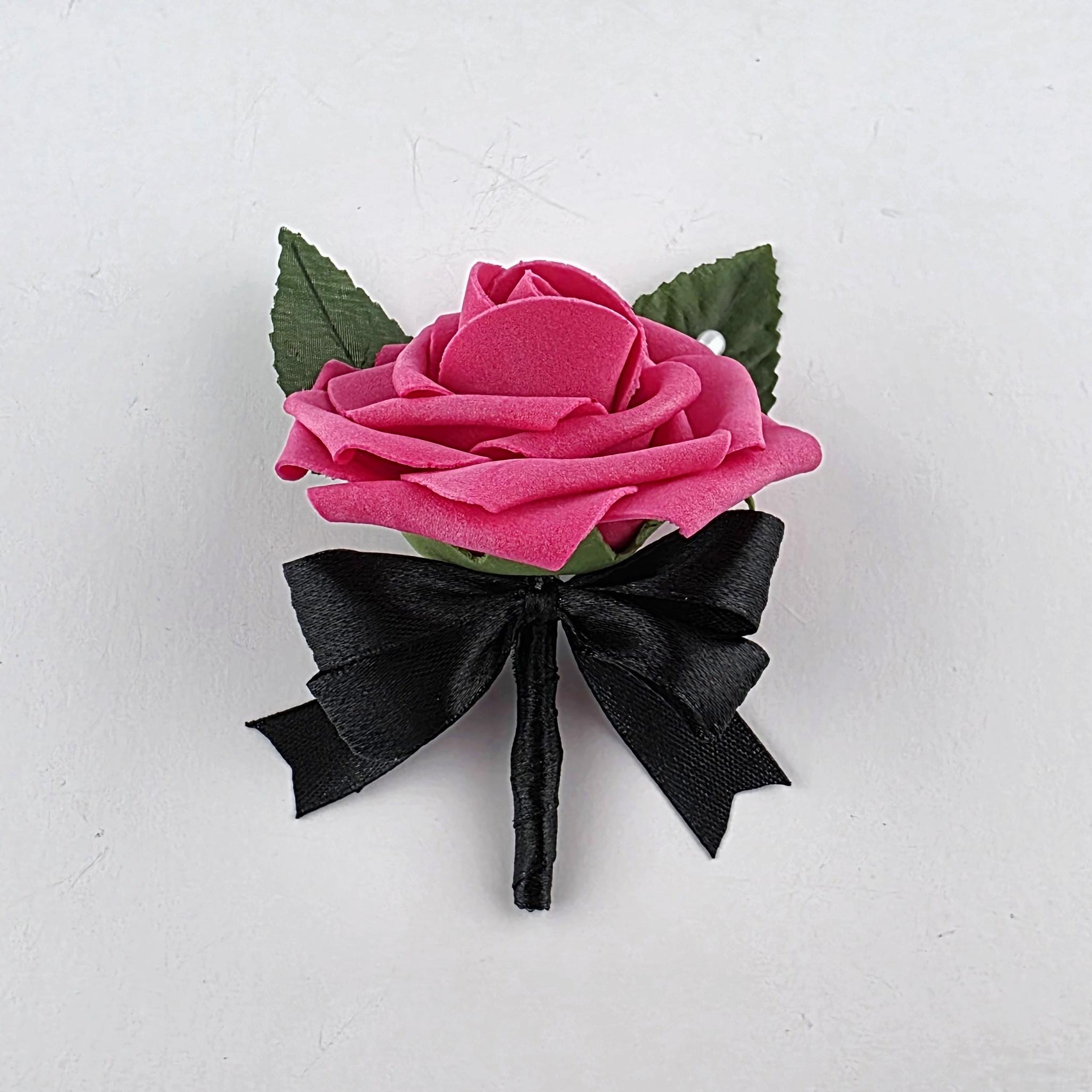 Hot pink and black boutonniere with pearl pin