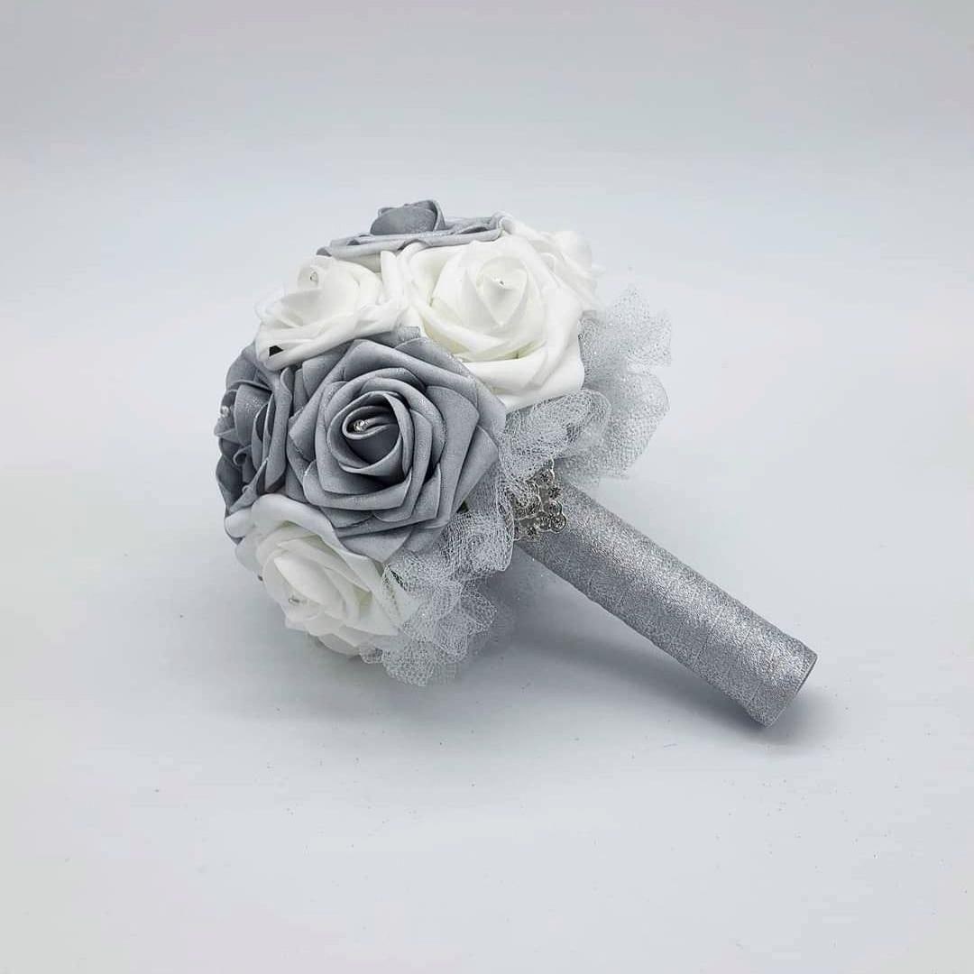 White and silver real touch rose bouquet with silver ribbon and tulle