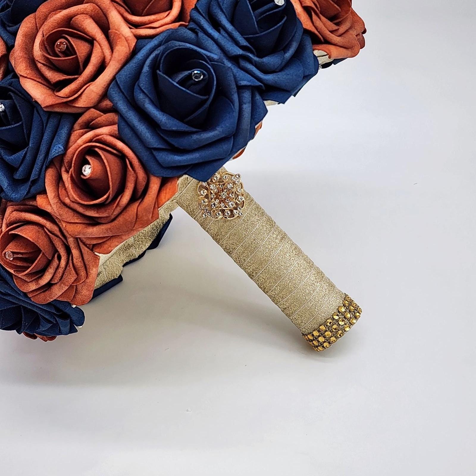 Gold ribbon with gold brooch and bling wrap
