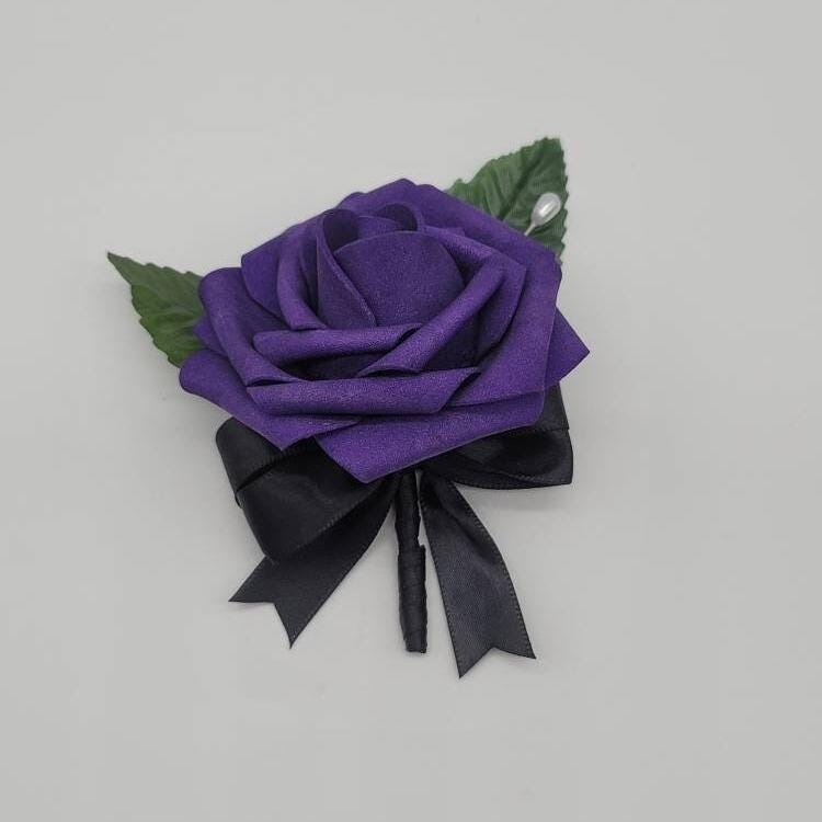 Dark purple boutonniere with black ribbon, 2 faux leaves and pearl pin