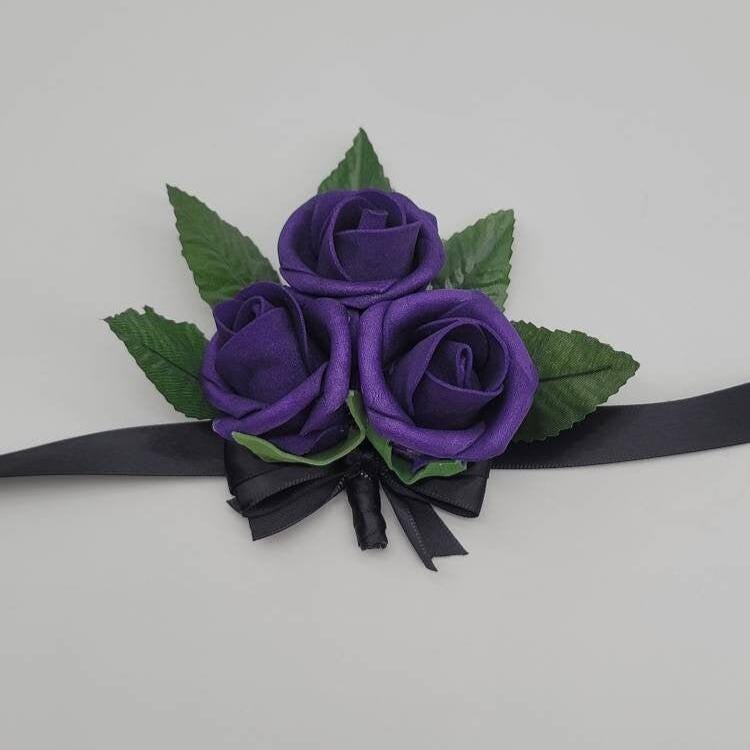 Dark purple wrist corsage with black ribbon made from Real Touch Roses