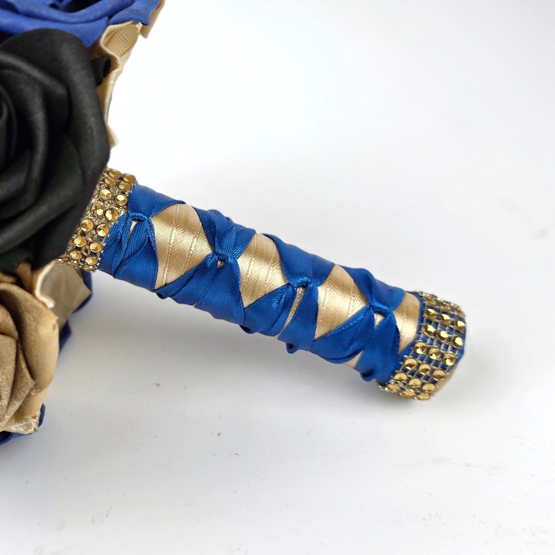 Royal Blue, Black, & Gold 6" Toss Bouquet
Bold. Regal